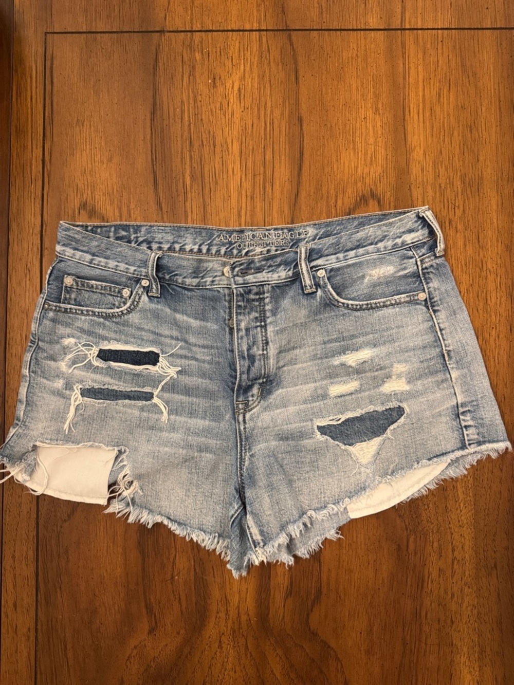 American Eagle Vintage Hi-Rise Festival Light Wash Distressed Denim Shorts